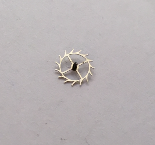Omega 711 escape wheel and pinion with straight pivots part