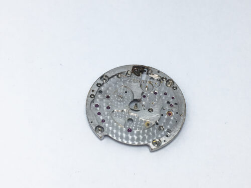 Piaget caliber 12PC main plate with setting lever and center pinion part 100