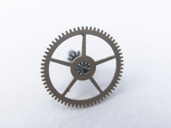 Rolex caliber 1210 center wheel with cannon pinion part 7504