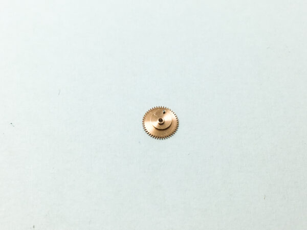 Omega 611 date indicator driving wheel, mounted part 1564