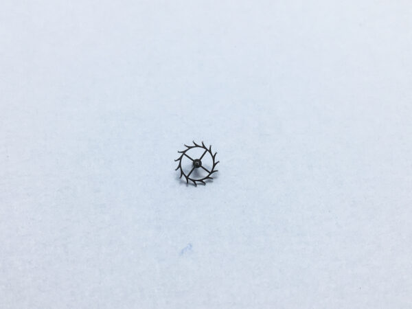 Omega 552 escape wheel and pinion with straight pivots part 1305