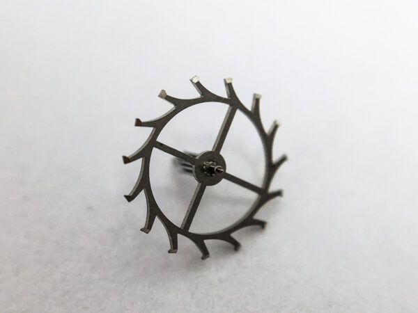 Zenith caliber 106-50-6 escape wheel and pinion with straight pivots part 705