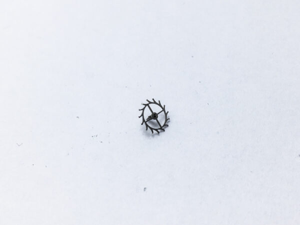 Omega caliber 510 escape wheel and pinion with straight pivots part 1305