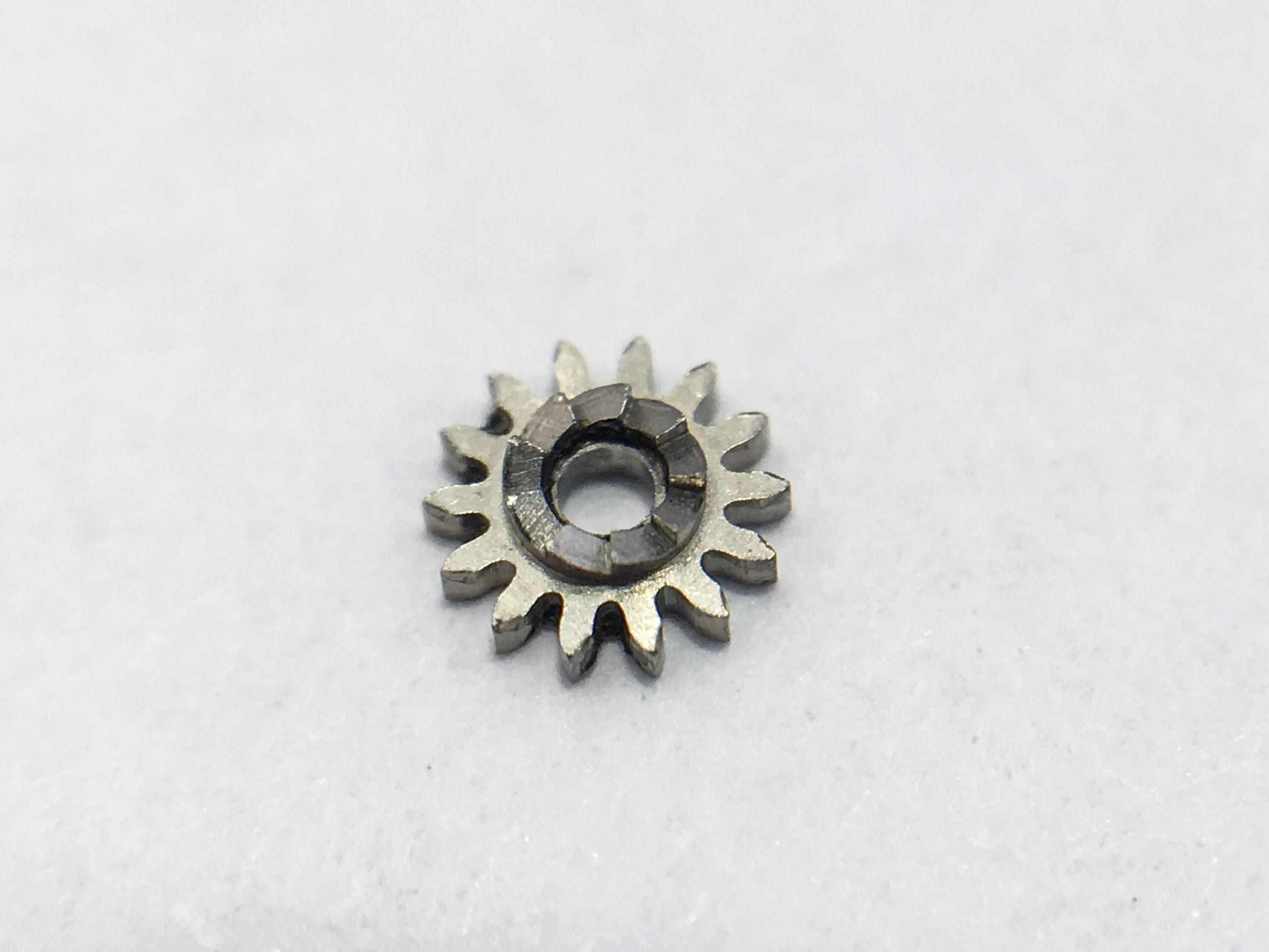 Omega 552 winding pinion part 1108