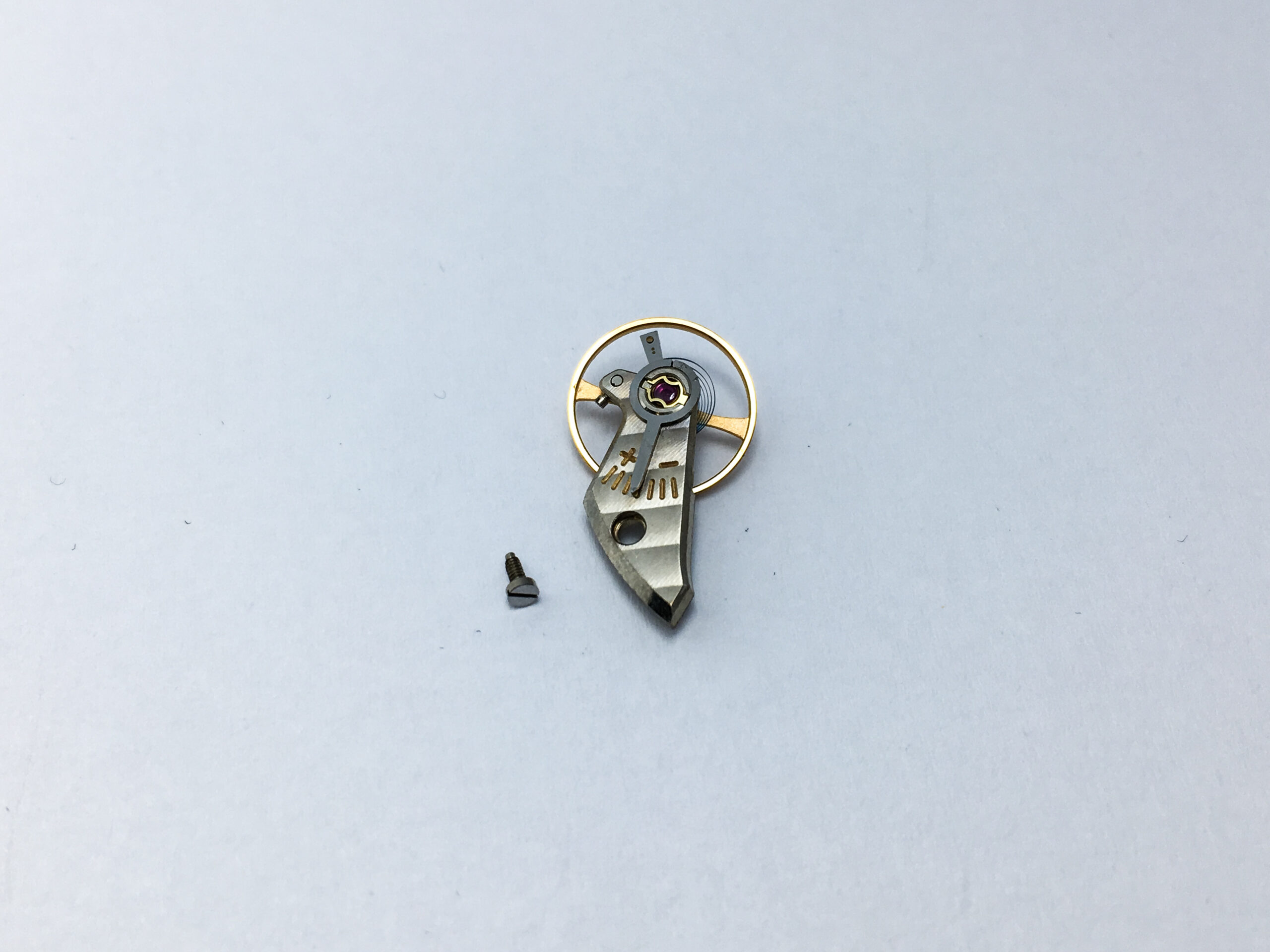 Universal Geneve caliber 215, 215-1 balance wheel with bridge part