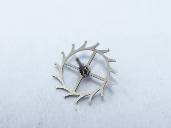 Universal Geneve caliber 215-1 escape wheel and pinion with straight pivots part 705 - Image 2