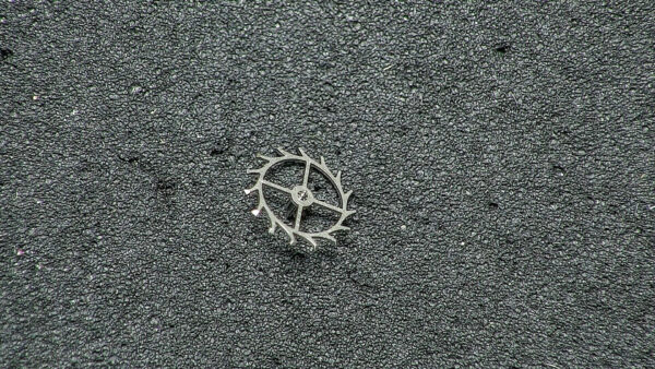 Movado 246 escape wheel and pinion with straight pivots part 705