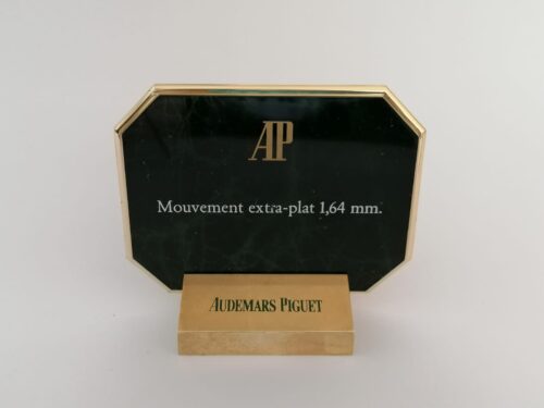 Vintage Audemars Piguet watch ads display extra plat