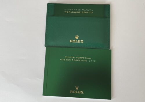 New Rolex Oyster Perpetual booklet set with guarantee manual and leather holder